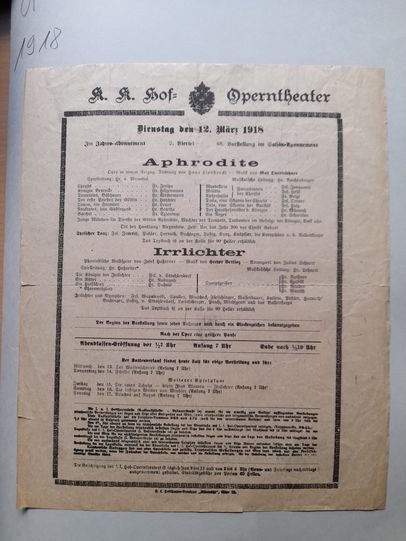 Program sheet of the K. K. Hof-Operntheater dated Tuesday, March 12, 1918, for the play 'Aphrodite' and 'Irrlichter', including performance time and cast list. The sheet contains detailed information on the performance times, the artists and various notes for the audience. At the bottom of the sheet are instructions for the next performances and general information about the theater.